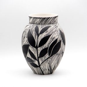 Vase & black leaves | Guy Jana