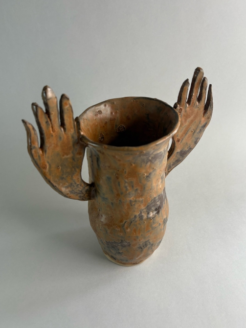 A Praying Vase in Copper